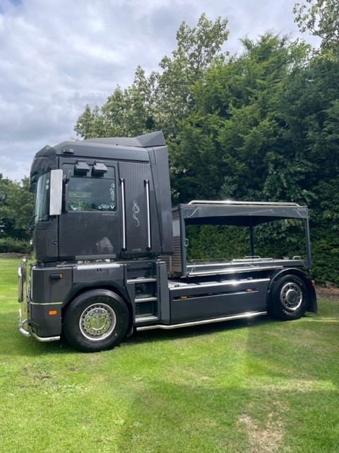 Renault Magnum truck hearse for specialist funeral hire in the UK