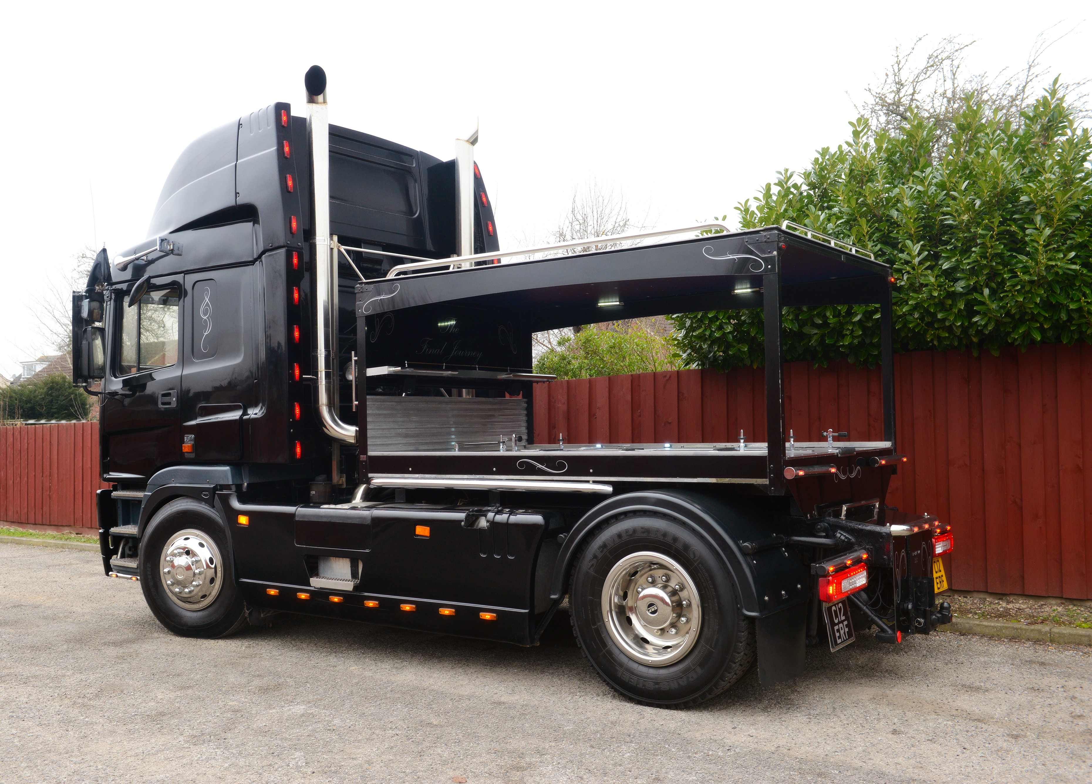 ERF EC12 lorry hearse for bespoke funeral transport in the UK